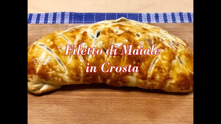 Delizioso filetto di maiale avvolto in crosta di pasta sfoglia con un tocco di senape: un gusto irresistibile!